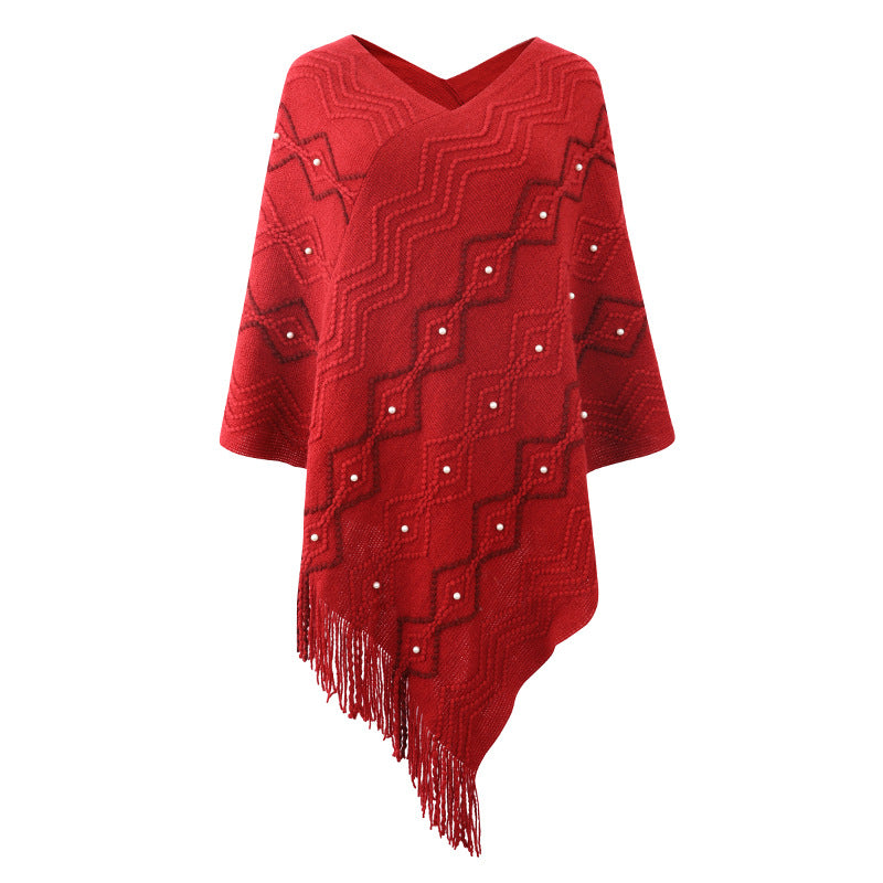 Damer elegant poncho med iögonfallande strukturmönster och dekorativa fransar Mirla-Eva Jonsson