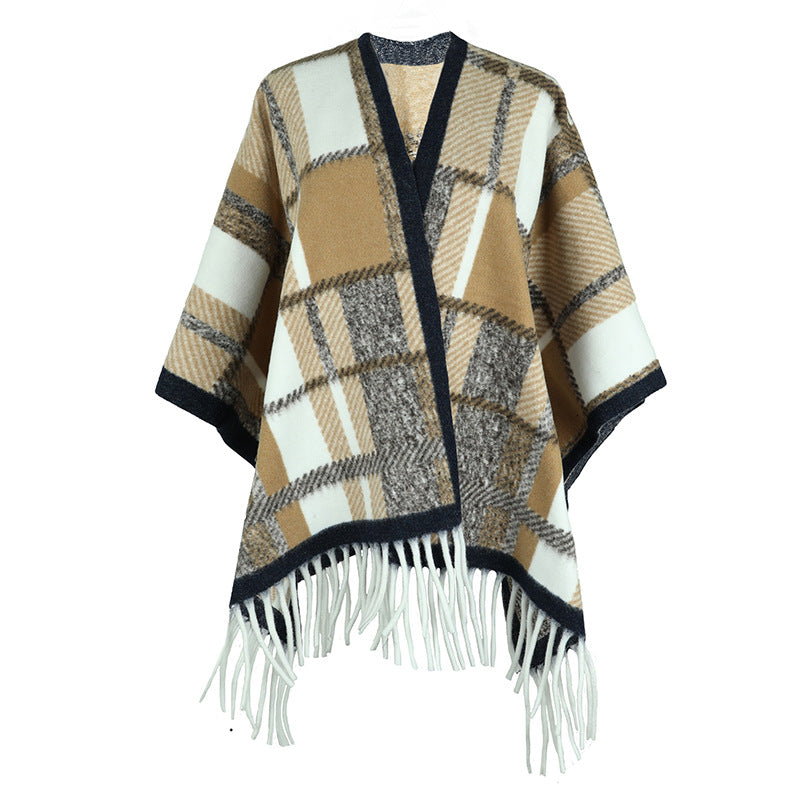 Damer elegant poncho med modern rutig mönster och fransar Mirla-Eva Jonsson