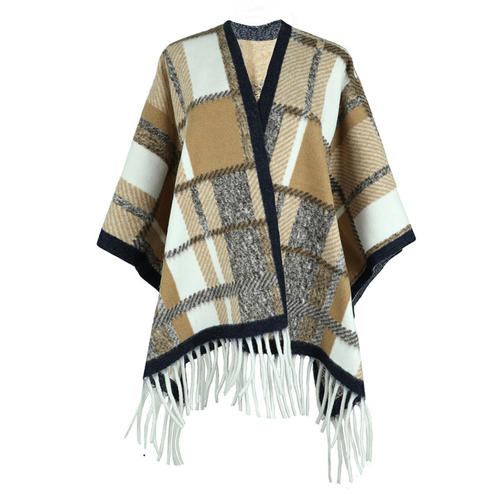 Damer elegant poncho med modern rutig mönster och fransar Mirla-Eva Jonsson