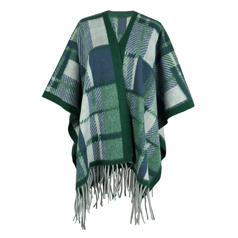 Damer elegant poncho med modern rutig mönster och fransar Mirla-Eva Jonsson