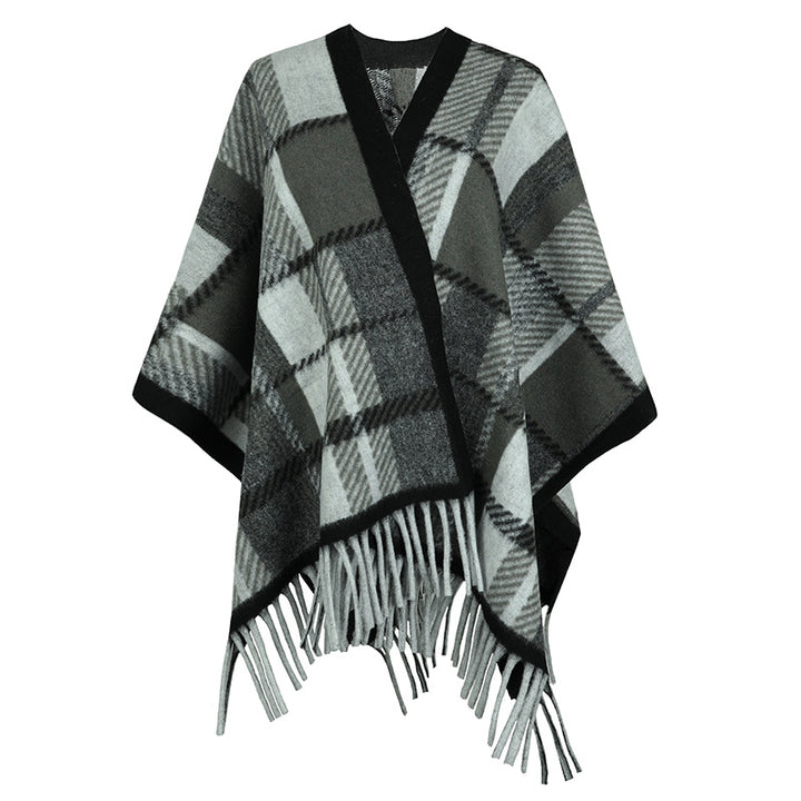 Damer elegant poncho med modern rutig mönster och fransar Mirla-Eva Jonsson