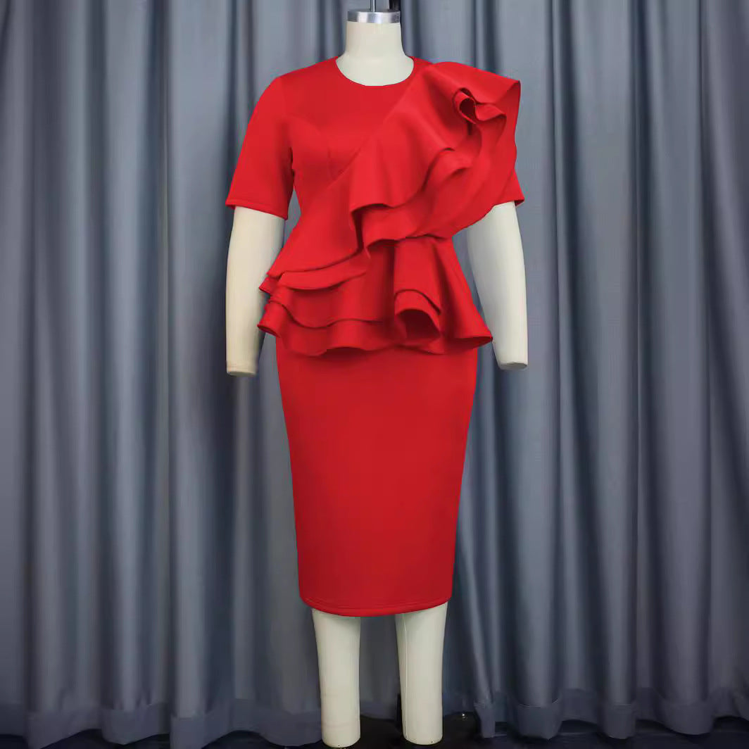Damer elegant ruffleklänning med figursydd siluett Mirla-Eva Jonsson