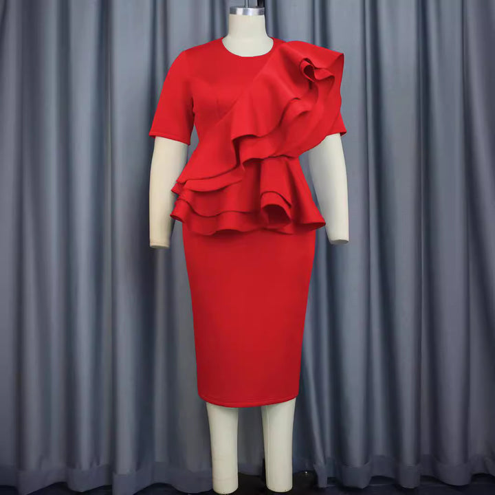 Damer elegant ruffleklänning med figursydd siluett Mirla-Eva Jonsson