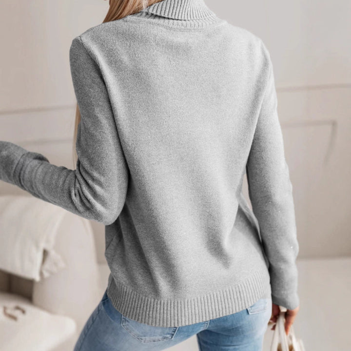 Damer elegant rullkragepolo med knapppdetaljer Mirla-Eva Jonsson