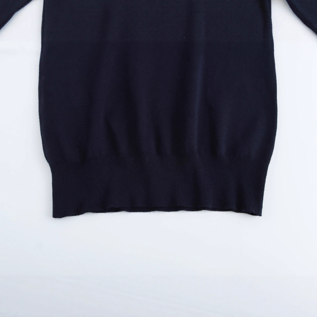 Damer elegant rullkragepullover med knapppdetail Mirla-Eva Jonsson