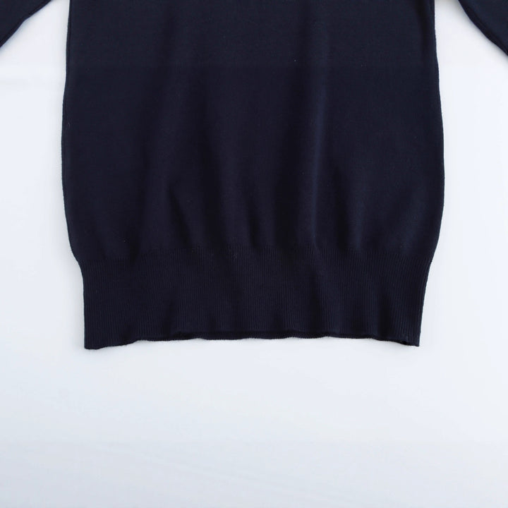 Damer elegant rullkragepullover med knapppdetail Mirla-Eva Jonsson