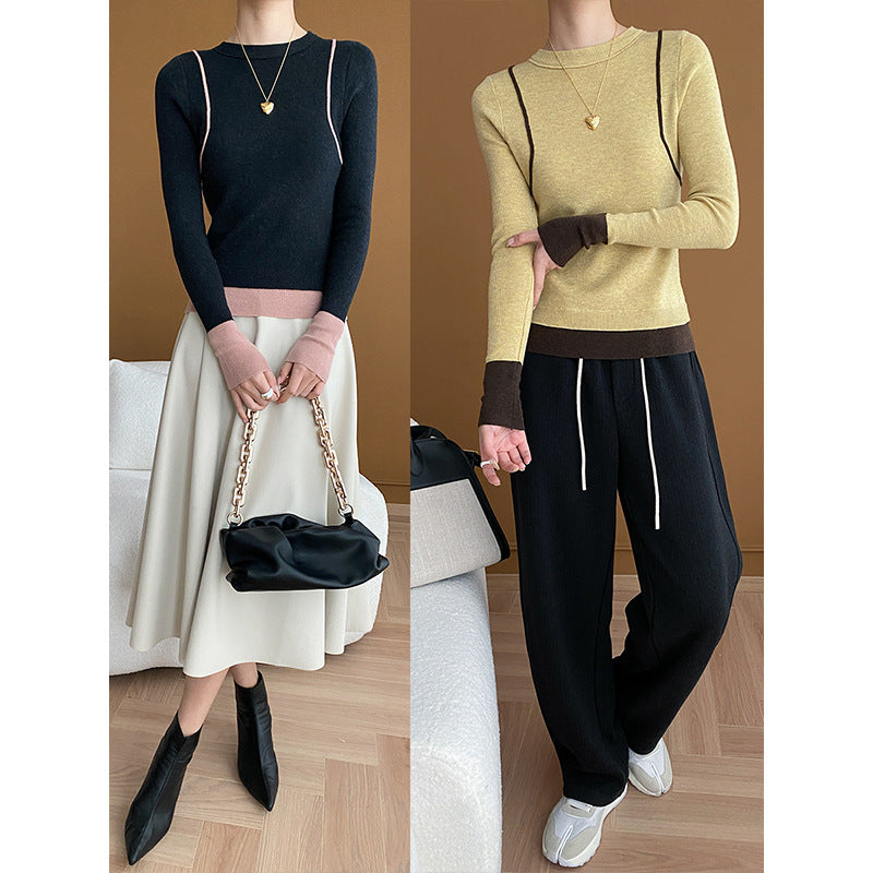 Damer elegant rundhalsad tröja med kontrasterande ärmar och fin ribbad textur Mirla-Eva Jonsson