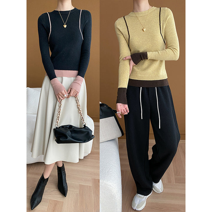 Damer elegant rundhalsad tröja med kontrasterande ärmar och fin ribbad textur Mirla-Eva Jonsson
