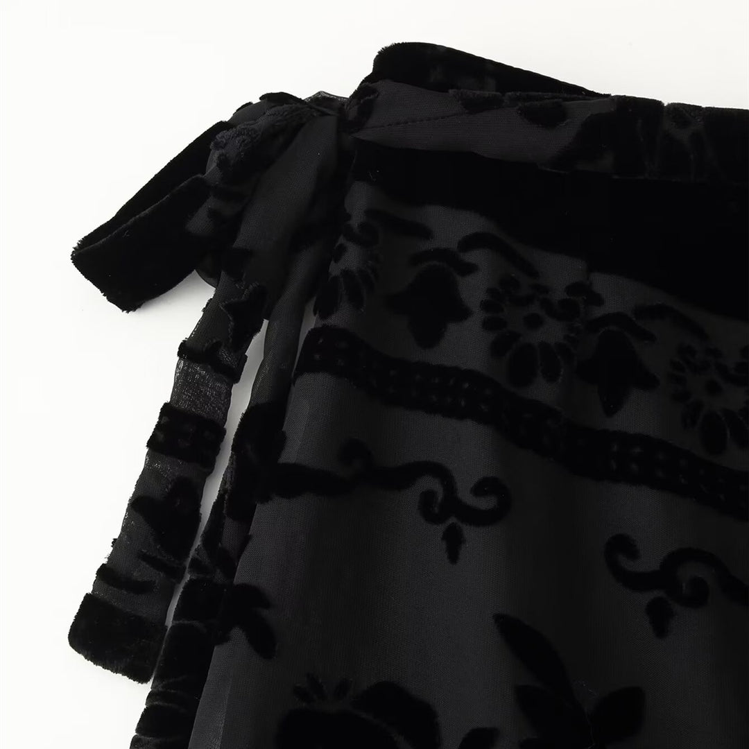 Damer elegant sammrock med fransprydda detaljer och sidobindebälte Mirla-Eva Jonsson