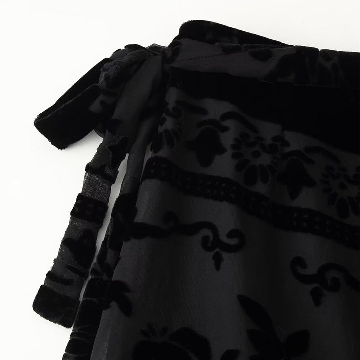 Damer elegant sammrock med fransprydda detaljer och sidobindebälte Mirla-Eva Jonsson