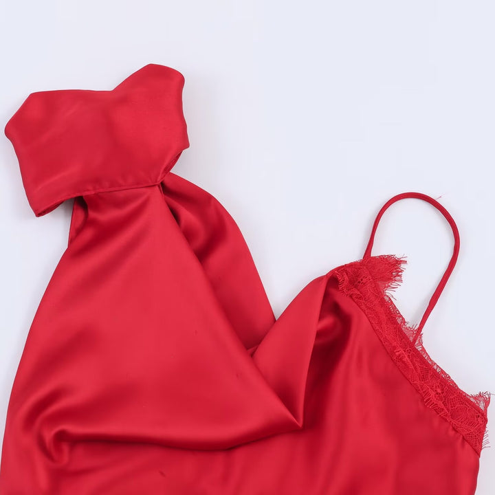 Damer elegant satin-top med asymmetrisk nederkant och spetsdetaljer Mirla-Eva Jonsson