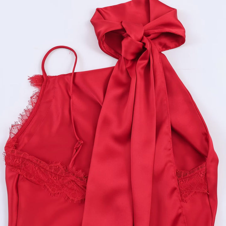 Damer elegant satin-top med asymmetrisk nederkant och spetsdetaljer Mirla-Eva Jonsson