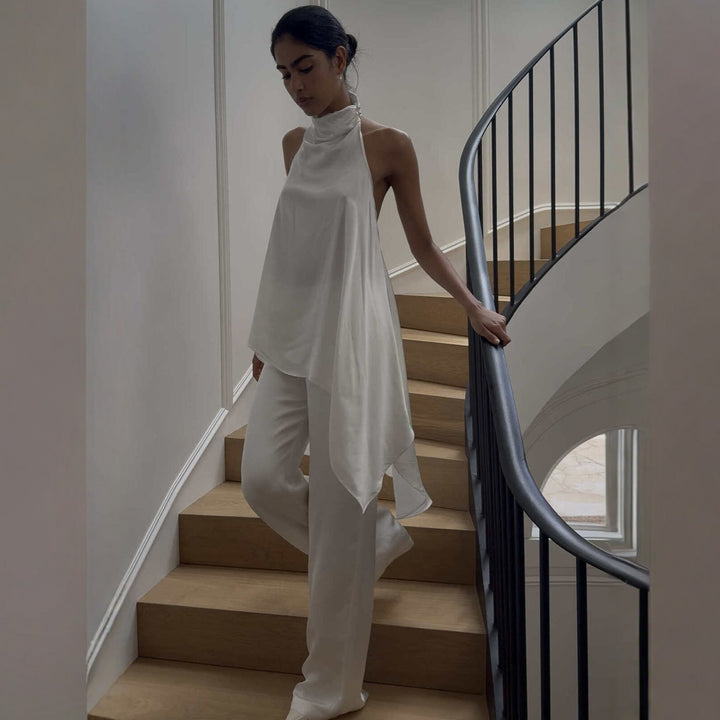 Damer elegant satinert overall med asymmetrisk snitt Mirla-Eva Jonsson