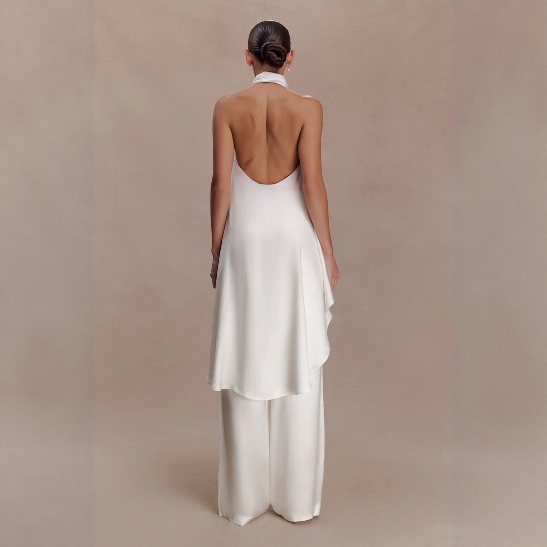Damer elegant satinert overall med asymmetrisk snitt Mirla-Eva Jonsson