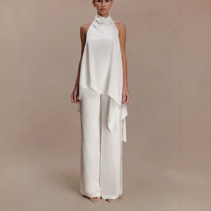 Damer elegant satinert overall med asymmetrisk snitt Mirla-Eva Jonsson