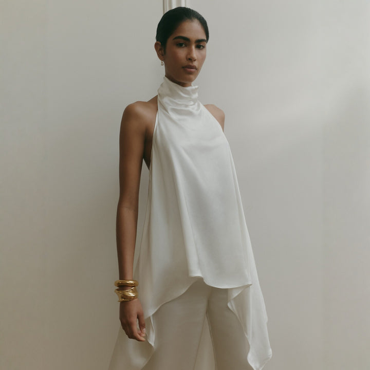 Damer elegant satinert overall med asymmetrisk snitt Mirla-Eva Jonsson