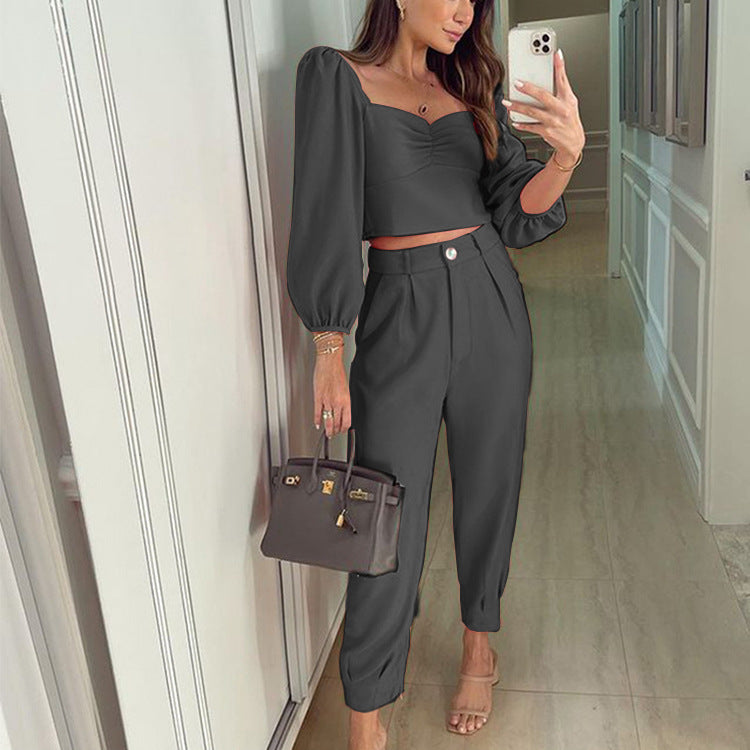 Damer elegant set av kort topp och hög midja byxor Mirla-Eva Jonsson
