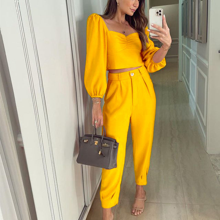 Damer elegant set av kort topp och hög midja byxor Mirla-Eva Jonsson