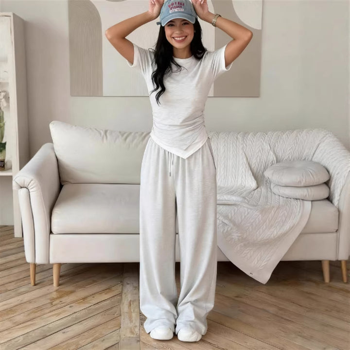 Damer elegant set av kortärmad skjorta och vida byxor Mirla-Eva Jonsson