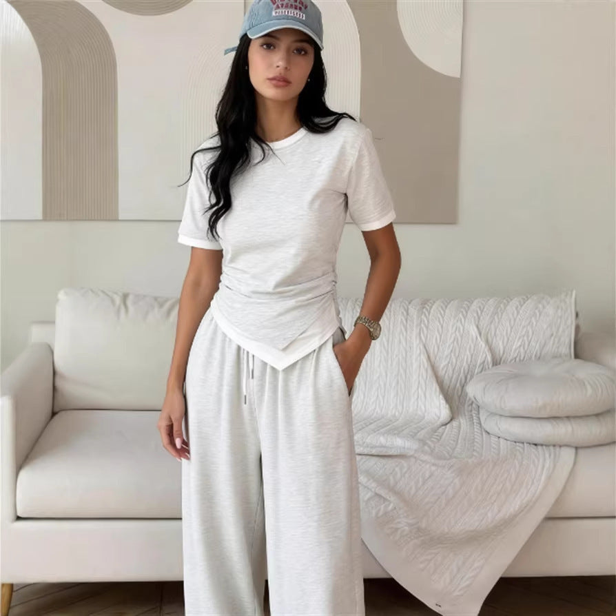 Damer elegant set av kortärmad skjorta och vida byxor Mirla-Eva Jonsson