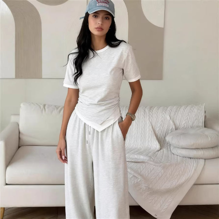 Damer elegant set av kortärmad skjorta och vida byxor Mirla-Eva Jonsson