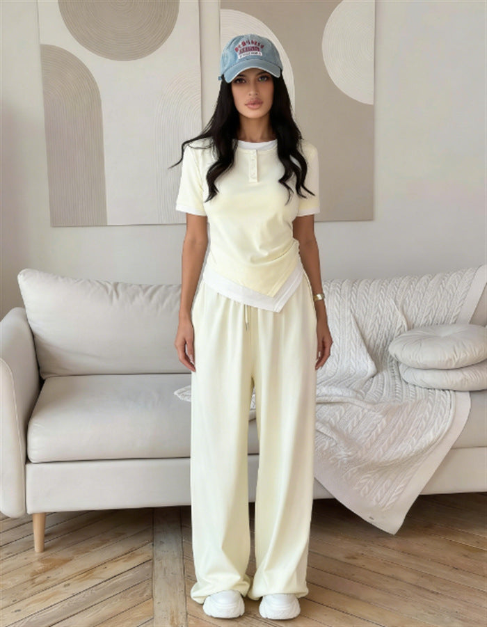 Damer elegant set av kortärmad skjorta och vida byxor Mirla-Eva Jonsson