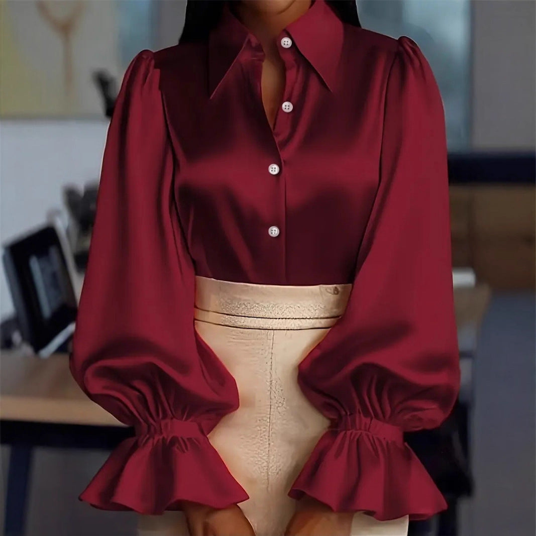 Damer elegant sidenblus med puffärmar och stilren knapplist Mirla-Eva Jonsson