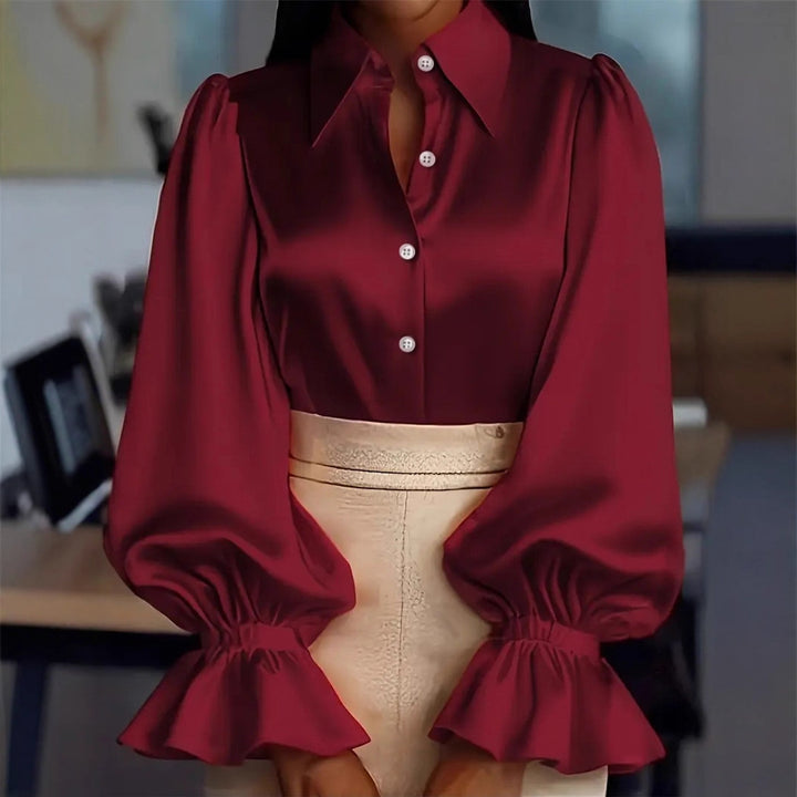 Damer elegant sidenblus med puffärmar och stilren knapplist Mirla-Eva Jonsson