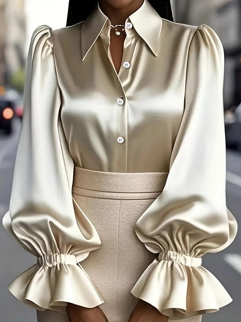Damer elegant sidenblus med puffärmar och stilren knapplist Mirla-Eva Jonsson