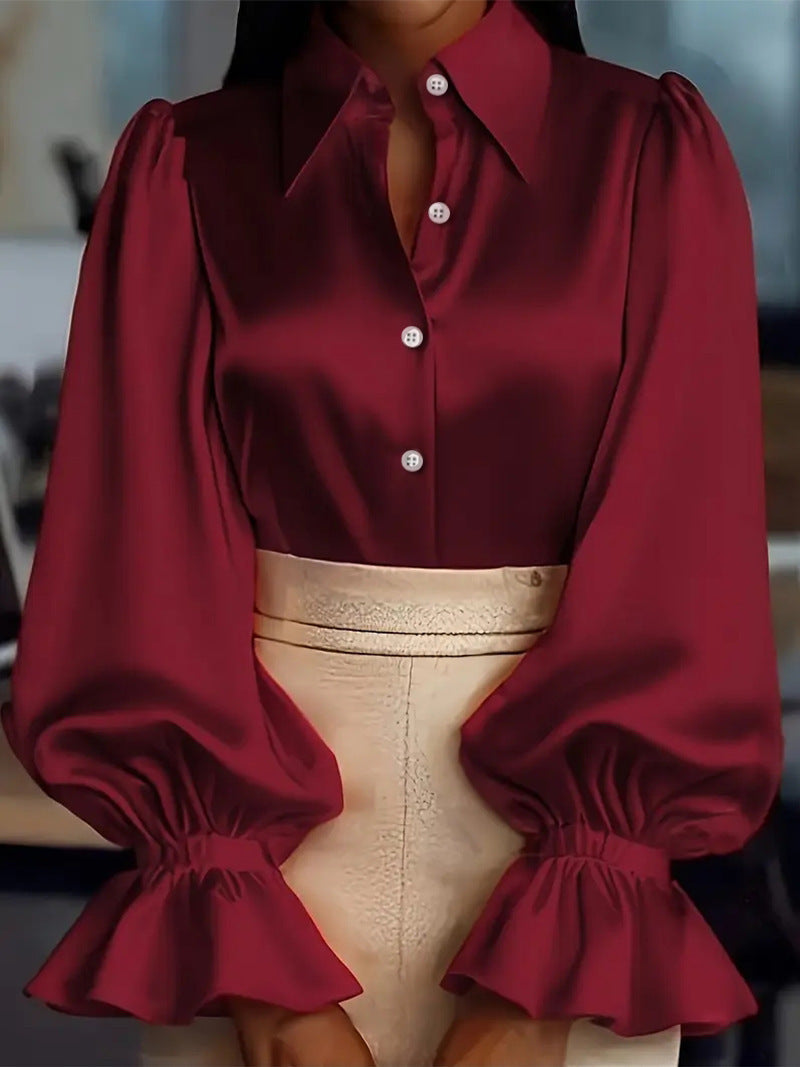 Damer elegant sidenblus med puffärmar och stilren knapplist Mirla-Eva Jonsson