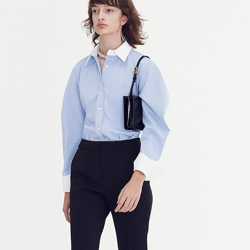 Damer elegant skjortblus med modern skärning och kontrasterande detaljer Mirla-Eva Jonsson