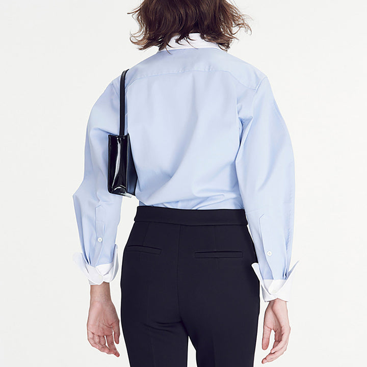 Damer elegant skjortblus med modern skärning och kontrasterande detaljer Mirla-Eva Jonsson