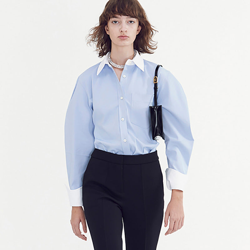 Damer elegant skjortblus med modern skärning och kontrasterande detaljer Mirla-Eva Jonsson