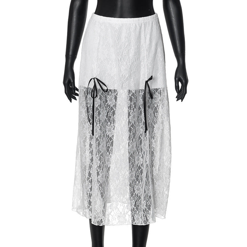 Damer elegant spetskjol med transparenta insatser och raffinerade bindsnören Mirla-Eva Jonsson
