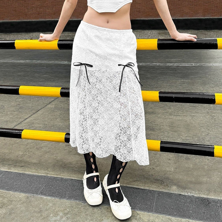 Damer elegant spetskjol med transparenta insatser och raffinerade bindsnören Mirla-Eva Jonsson