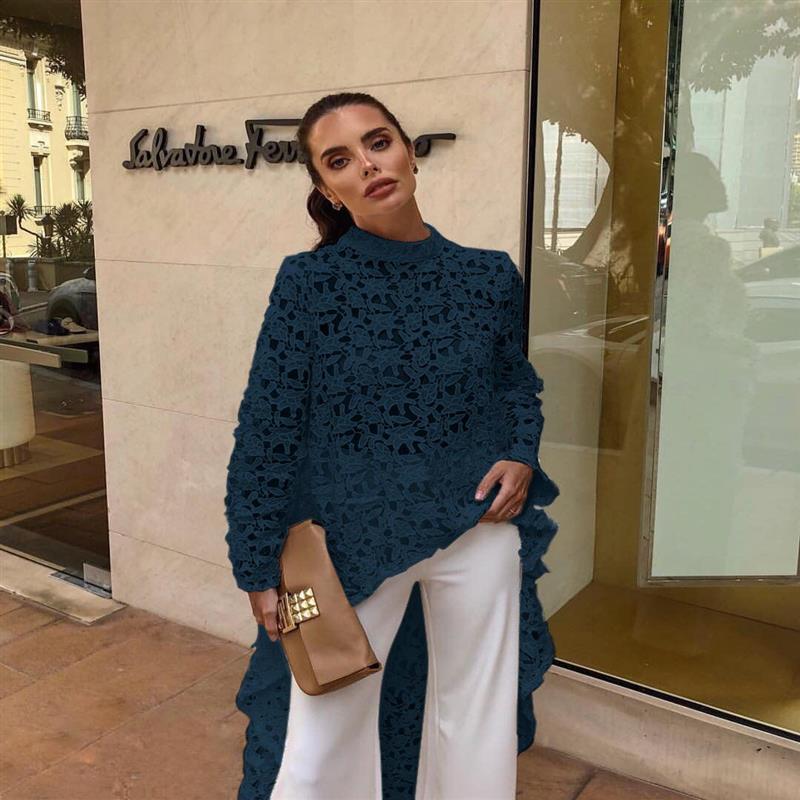 Damer elegant spetsöverdel med asymmetrisk nederkant och volangdetaljer Mirla-Eva Jonsson