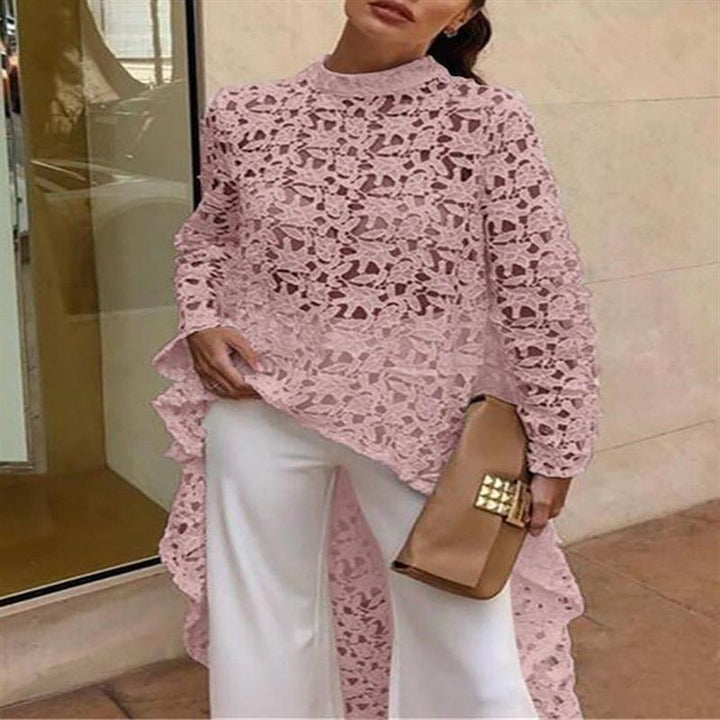 Damer elegant spetsöverdel med asymmetrisk nederkant och volangdetaljer Mirla-Eva Jonsson