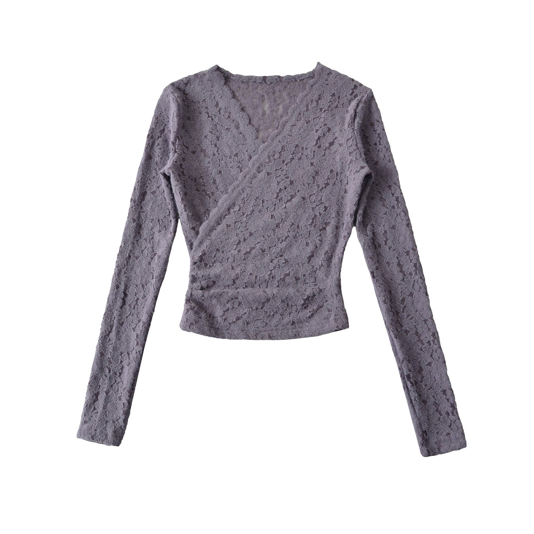 Damer elegant spetsöverdel med wrap-design och långa ärmar Mirla-Eva Jonsson