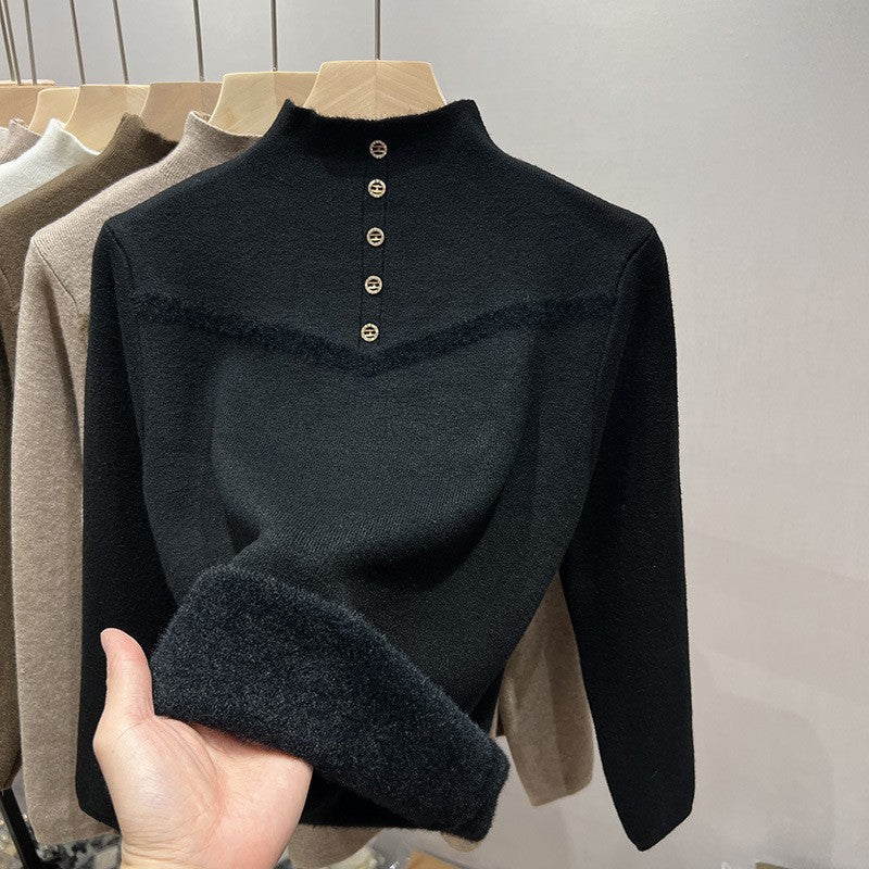 Damer elegant ståkrage tröja med dekorativa knappar och mjuk textur Mirla-Eva Jonsson