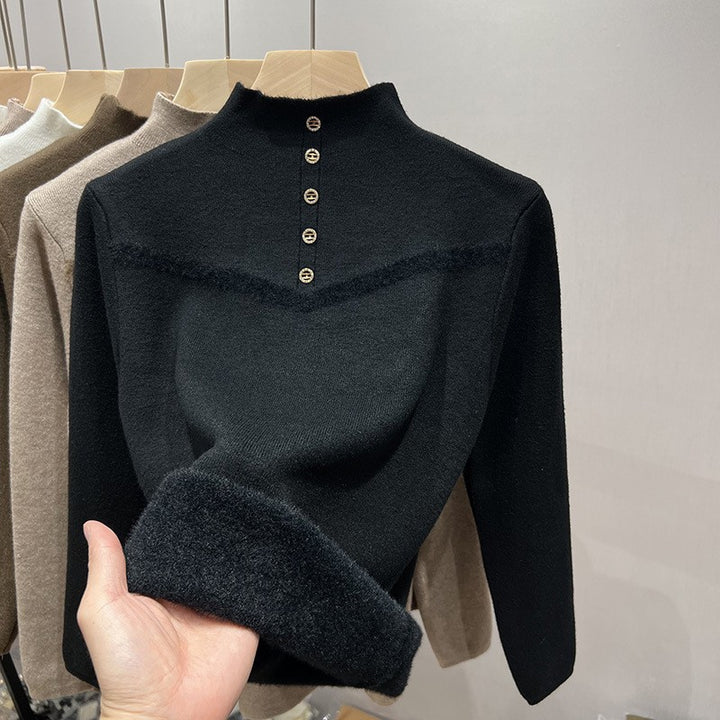 Damer elegant ståkrage tröja med dekorativa knappar och mjuk textur Mirla-Eva Jonsson
