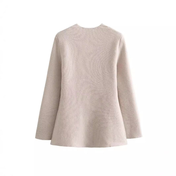 Damer elegant stickad jacka med asymmetrisk skärning och knappdetalj Eva Jonsson-Eva Jonsson