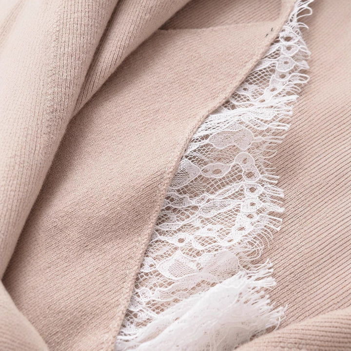 Damer elegant stickad jacka med moderiktig krage och fina knappdetaljer Mirla-Eva Jonsson