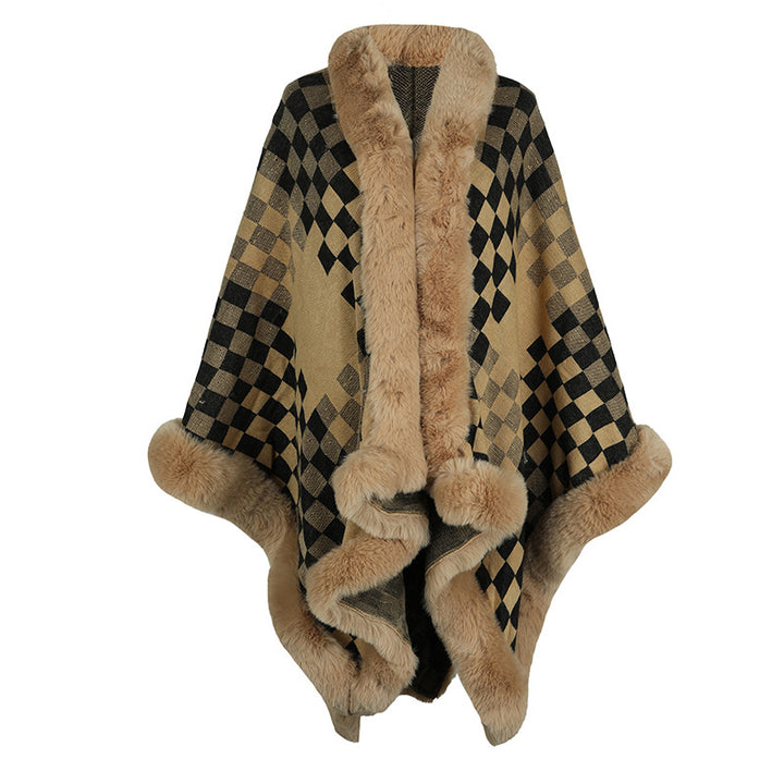 Damer elegant stickad poncho med lyxig konstpälsbesättning och geometriskt mönster Mirla-Eva Jonsson