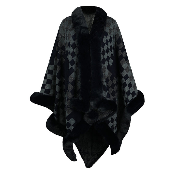 Damer elegant stickad poncho med lyxig konstpälsbesättning och geometriskt mönster Mirla-Eva Jonsson
