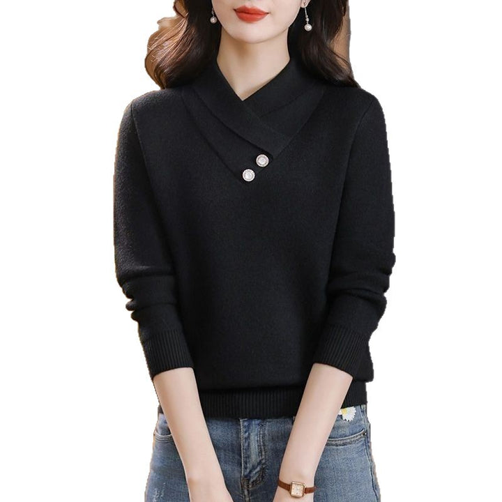 Damer elegant stickad pullover med chic V-hals och dekorativa knappdetaljer Mirla-Eva Jonsson