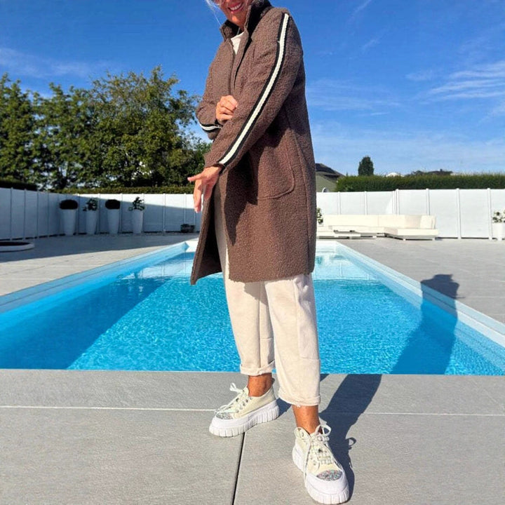 Damer elegant teddyjacka med två fickor och sportiga ränder Mirla-Eva Jonsson