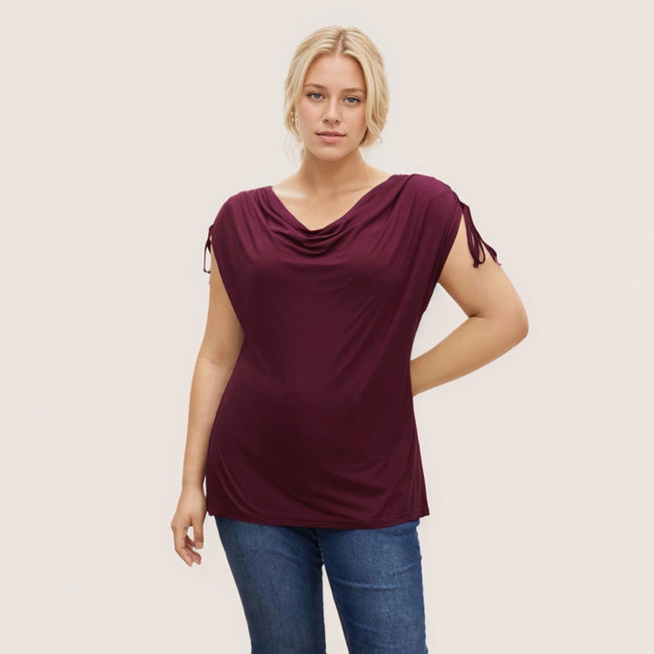 Damer elegant topp med avslappnad drapering och sidoband Mirla-Eva Jonsson