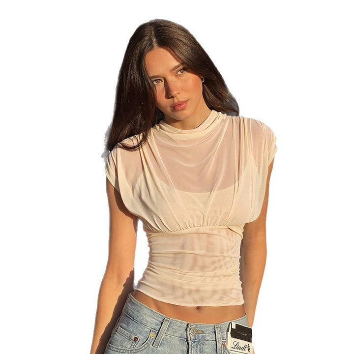 Damer elegant topp med modiga rynkor och transparent tyg Mirla-Eva Jonsson