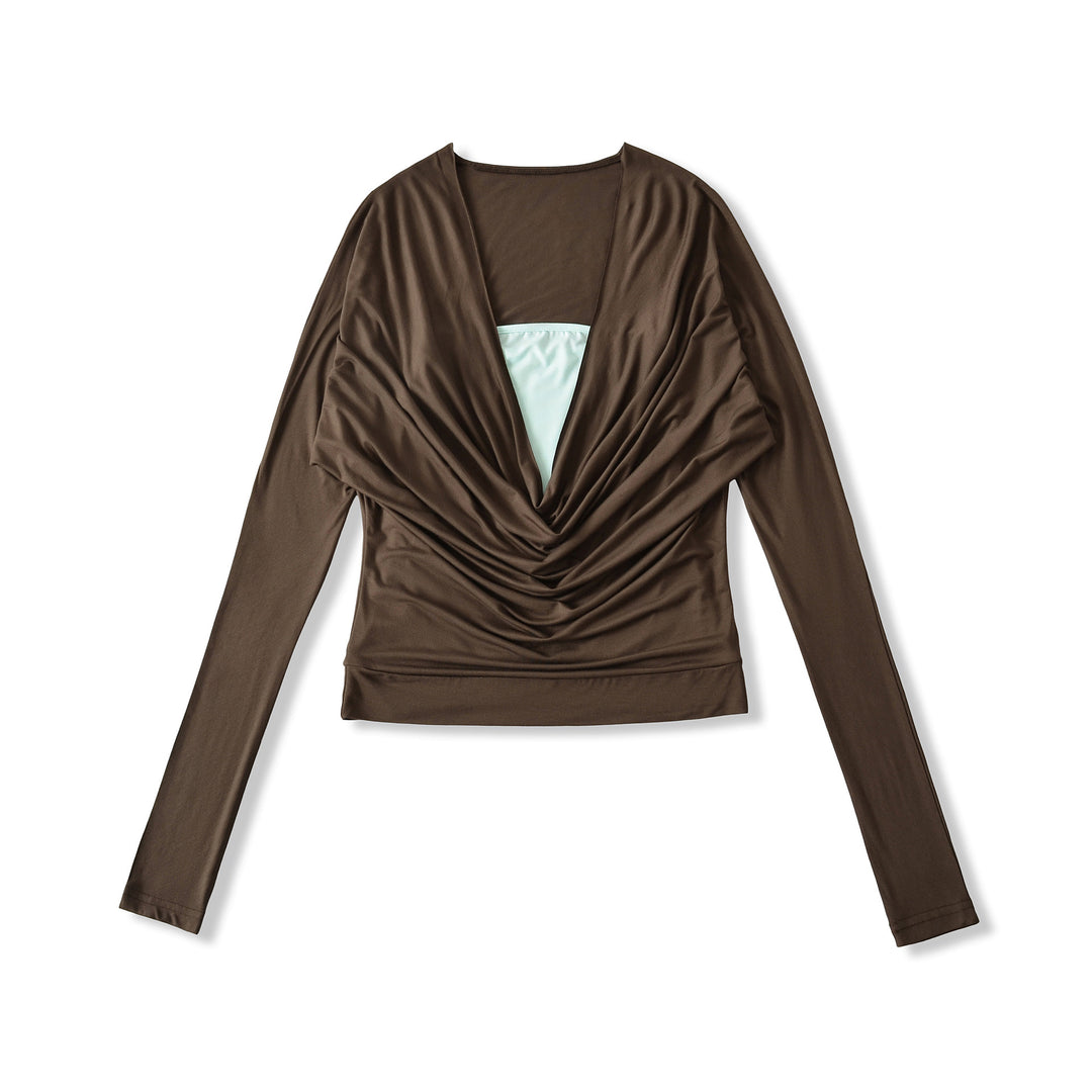 Damer elegant topp med raffinerad drapering och djup V-ringning Mirla-Eva Jonsson