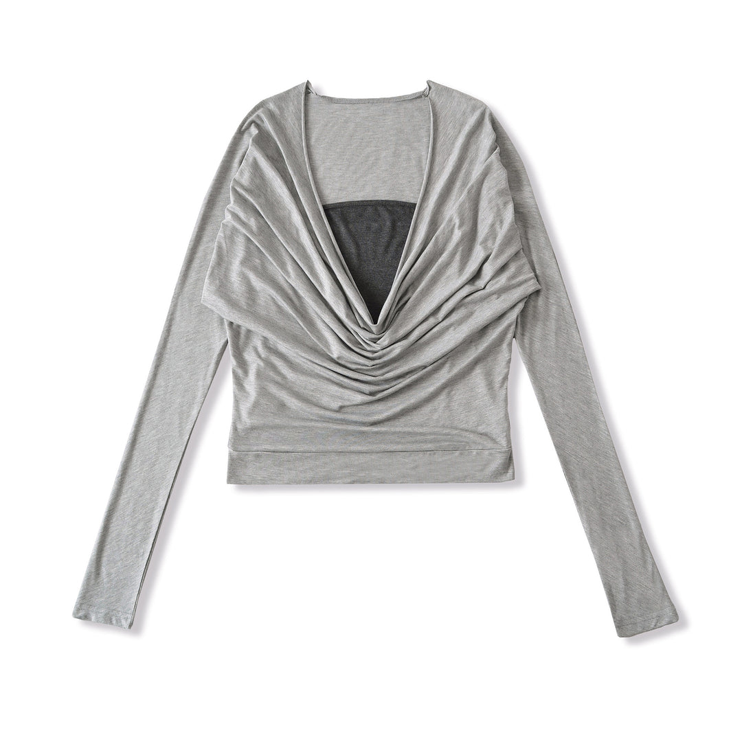 Damer elegant topp med raffinerad drapering och djup V-ringning Mirla-Eva Jonsson